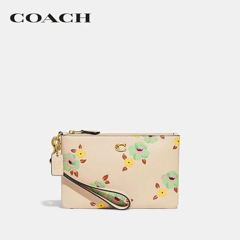 COACH กระเป๋าคล้องมือขนาดเล็กผู้หญิง รุ่น Small Wristlet With Floral Print สีขาว CH812 B4RHR 7a2af6f582dd11f0bfbaef83f2a17cdc