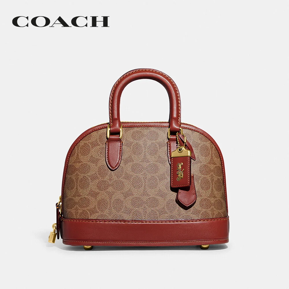 COACH กระเป๋าถือ ผู้หญิง รุ่น Revel Bag In Signature Canvas สีครีม CC414 B4NQ4 084d8903832b528949b6aa88c2c7773f