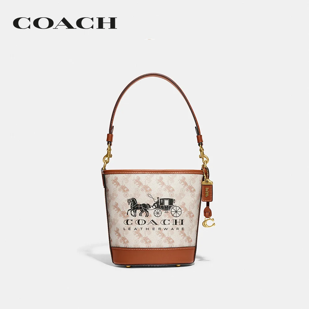 COACH กระเป๋าสะพายไหล่ ผู้หญิง รุ่น Dakota Bucket Bag 16 With Horse And Carriage Print สีครีม CJ828 B4TXF 17d68fe70cd73fa8f808ff06fe6c9d73