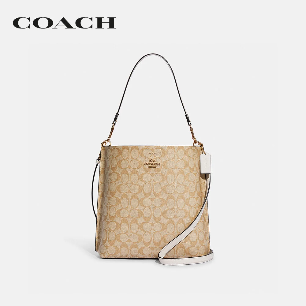 COACH กระเป๋าสะพายไหล่ ผู้หญิง รุ่น Mollie Bucket Bag In Signature Canvas สีครีม CA561 IMDQC 48baf37d262b33badd02a21a8621507a