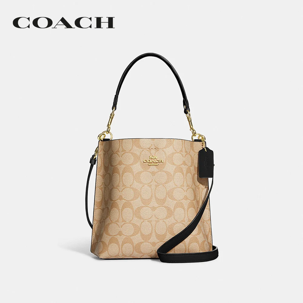 COACH กระเป๋าสะพายไหล่ ผู้หญิง รุ่น Mollie Bucket Bag 22 In Signature Canvas สีครีม CA582 IMCBI 930d1a74d3f24806474ae33a7ec076c4