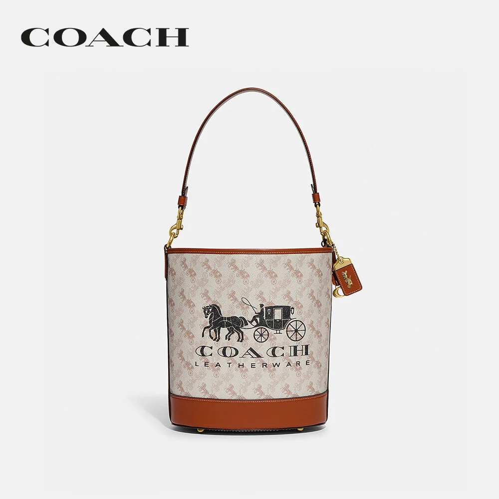 COACH กระเป๋าสะพายไหล่ ผู้หญิง รุ่น Dakota Bucket Bag With Horse And Carriage Print สีครีม CH733 B4TXF 947232c66f0bc6e1230e878f28fdbffb