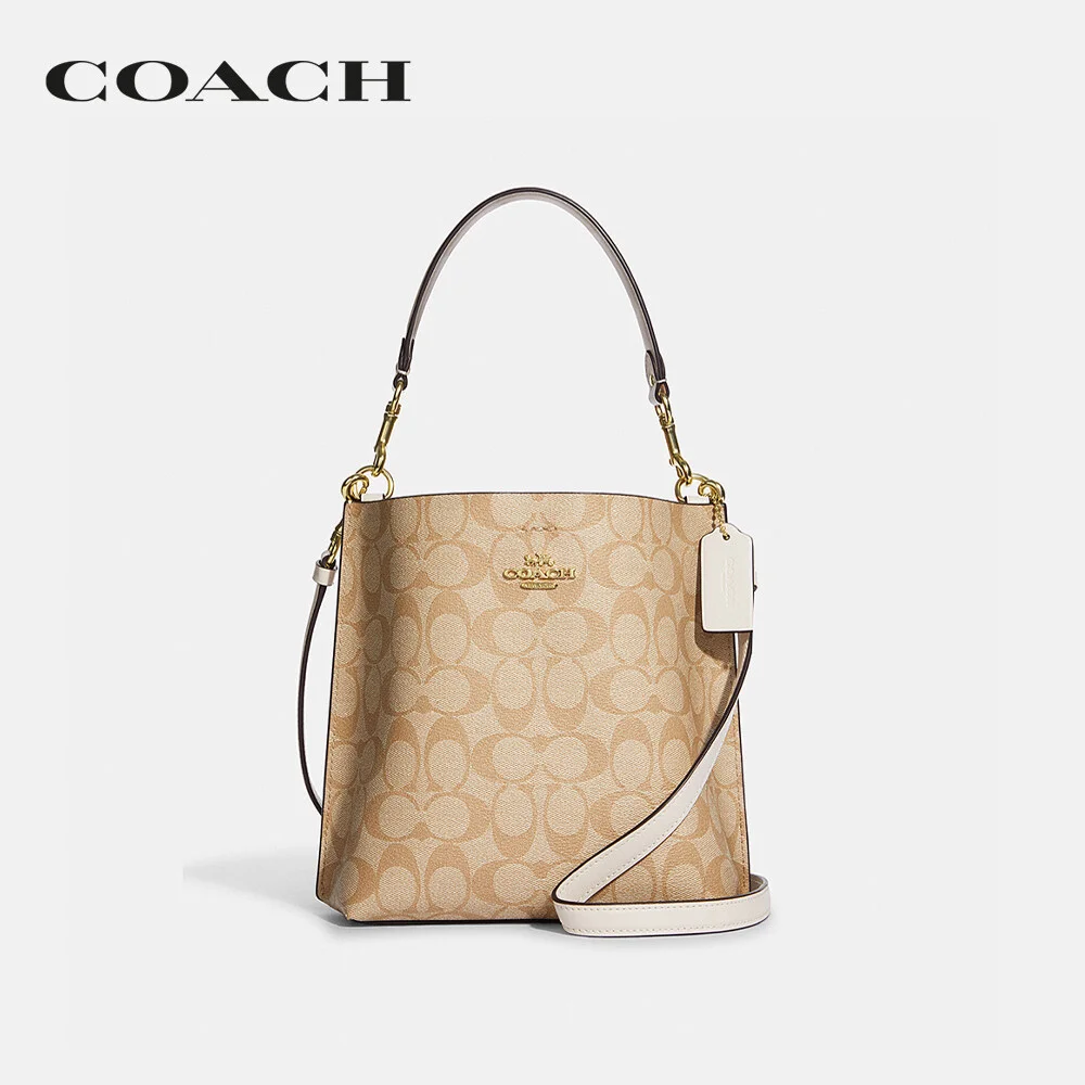 COACH กระเป๋าสะพายไหล่ ผู้หญิง รุ่น Mollie Bucket Bag 22 In Signature Canvas สีครีม CA582 IMDQC a767b4e2e50c195924e4cd760cc43573