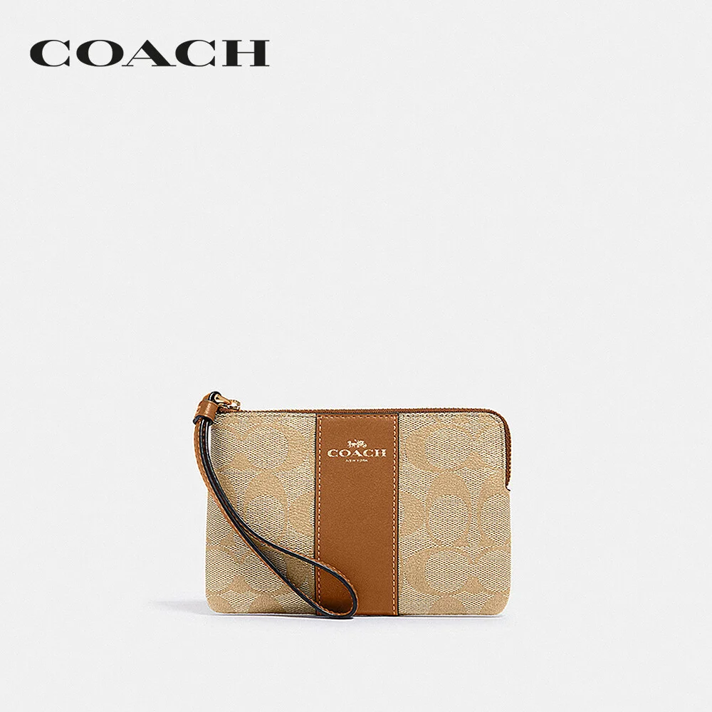 COACH กระเป๋าคล้องมือขนาดเล็ก ผู้หญิง รุ่น Corner Zip Wristlet In Signature Canvas สีครีม 58035 IMNLJ ae3bfef78ace7a96c85e8444eecc4211